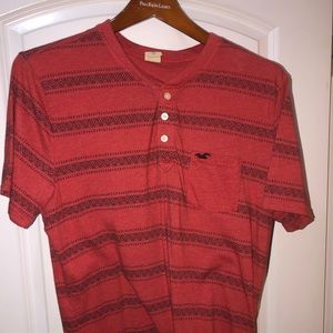 Men’s red Hollister T-shirt, two button with pocket. Aztec design
